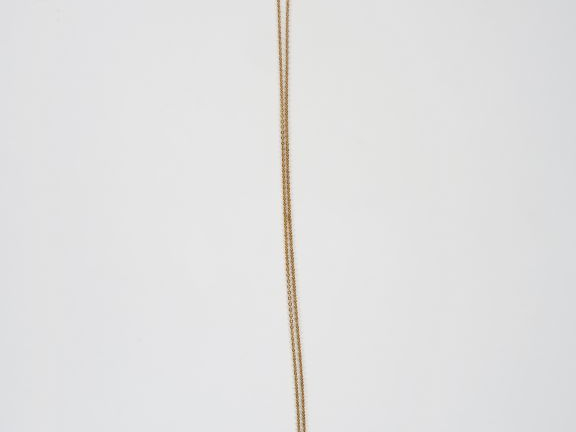 Chaine et son pendentif en forme de croix en or jaune. Poids. 9,07 gr