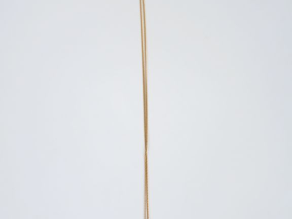 Médaille de baptême et sa chaine en or jaune.  Poids. 6,84 gr