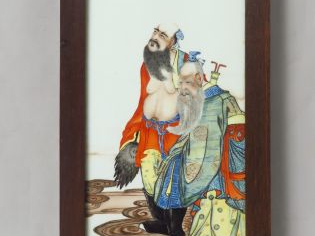 Deux plaques en porcelaine, d’une suite de quatre, chacune à décor pol