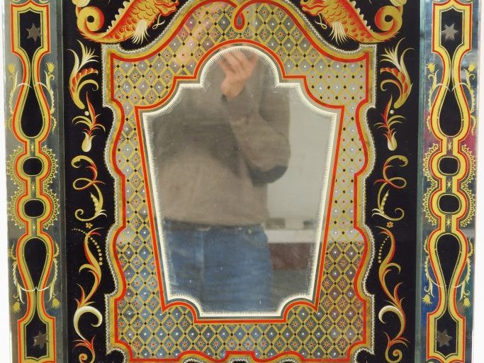 Miroir 1950 en verre églomisé. Dim. 63 x 55 cm