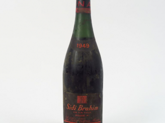 Vente aux enchères 1 BOUTEILLE SIDI BRAHIM VIGNA - 1949 - 5 CM 