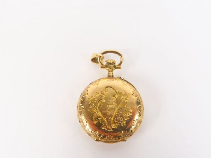 Montre de col en or jaune. Poids tel. 18,8 g