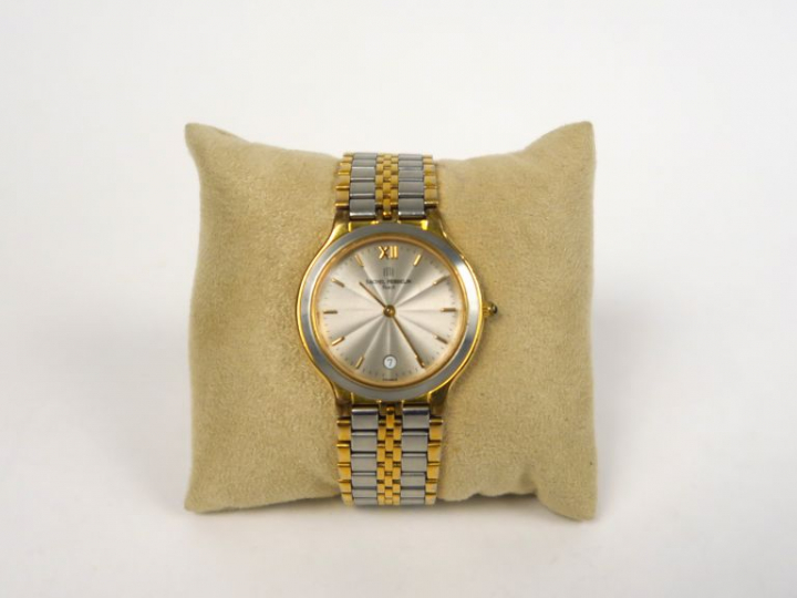 Michel HERBELIN  Montre de dame en métal et métal doré.