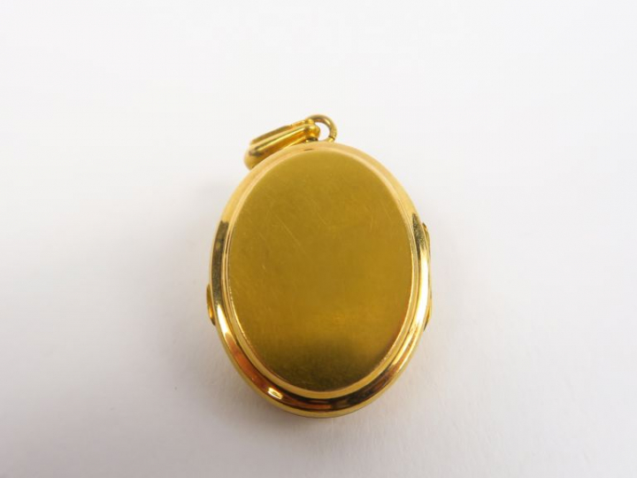 Pendentif porte photo 1900 en or, perles et rubis. Poids tel. 14,28 g