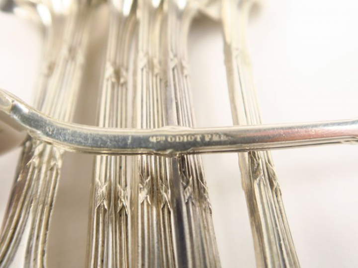 Partie de ménagère en argent, poinçon Minerve, à décor de tiges enruba