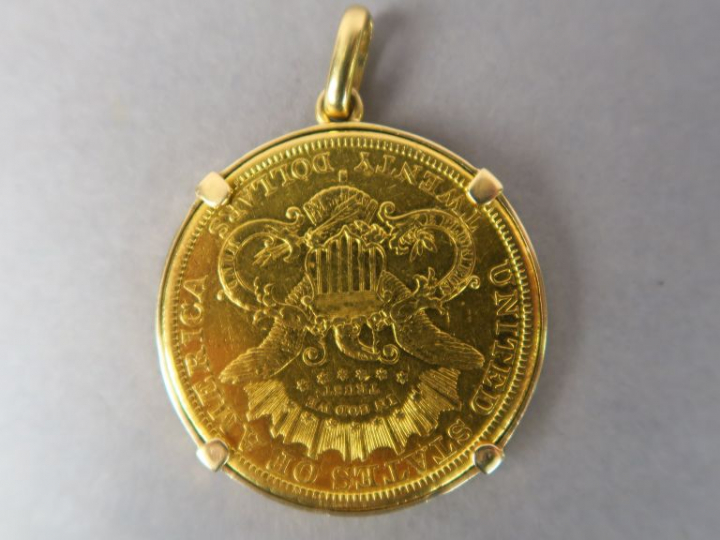 Pendentif en or jaune, orné d’une pièce de 20 dollars or 1877-S Poids.