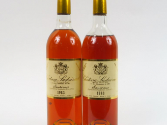 Vente aux enchères 2 BOUTEILLES CHÂTEAU SUDUIRAUT 1er CC SAUTERNES - 1983 - 1 HEP/1 MEP-B