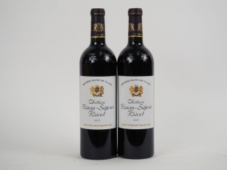 Vente aux enchères 2 BOUTEILLES CHÂTEAU BEAU-SEJOUR BECOT 1er GCC ST EMILION - 2015