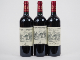 Vente aux enchères 3 BOUTEILLES CHÂTEAU CARBONNIEUX GC GRAVES - 2 de 2008 - 1 de 2011