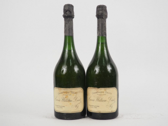 Vente aux enchères 2 BOUTEILLES CHAMPAGNE DEUTZ ' CUVEE WILLIAM DEUTZ' - 1966 - 2 CM et 4
