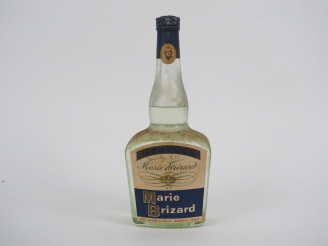 Vente aux enchères 1 BOUTEILLE EAU DE VIE DE DANTZIG MARIE BRIZARD + DE 50 ANS