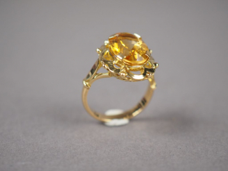 Vente aux enchères Bague en or jaune, ornée d'une citrine.  TDD. 55 Poids tel. 6,60 g