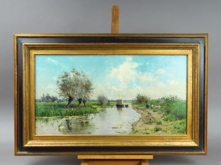 H.C DELPY. "Bord de rivière animé".  Huile sur toile, signée en bas à 