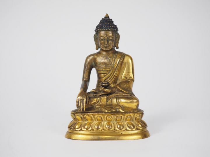 Statuette en bronze doré, représentant Bouddha assis sur un lotus fais
