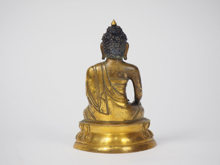 Statuette en bronze doré, représentant Bouddha assis sur un lotus fais