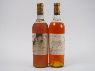 Vente aux enchères 2 BOUTEILLES CHÂTEAU CAILLOU SAUTERNES - 1964 - 1 BG/1 LB/ET