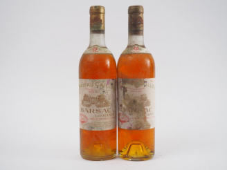 Vente aux enchères 2 BOUTEILLES CHÂTEAU CAILLOU SAUTERNES - 1966 - 2 BG/ET