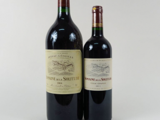 Vente aux enchères 2 FLACONS DOMAINE DE LA SOLITUDE GRAVES : 1 MAGNUM 2004 - 1 BOUTEILLE 