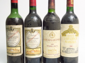 Vente aux enchères 4 BOUTEILLES MARGAUX : 1 CHÂTEAU LABEGORCE 1989 BG+ - 2 CHÂTEAU RAUZAN
