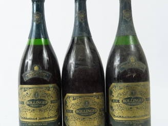 Vente aux enchères 3 MAGNUMS CHAMPAGNE BOLLINGER R.D. - 1973 - 0,5 CM/2 CM/3,5 CM SOUS LA