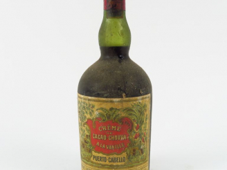 Vente aux enchères 1 VIEILLE BOUTEILLE CREME DE CACAO CHOUVA A LA VANILLE 'PUERTO CABELLO