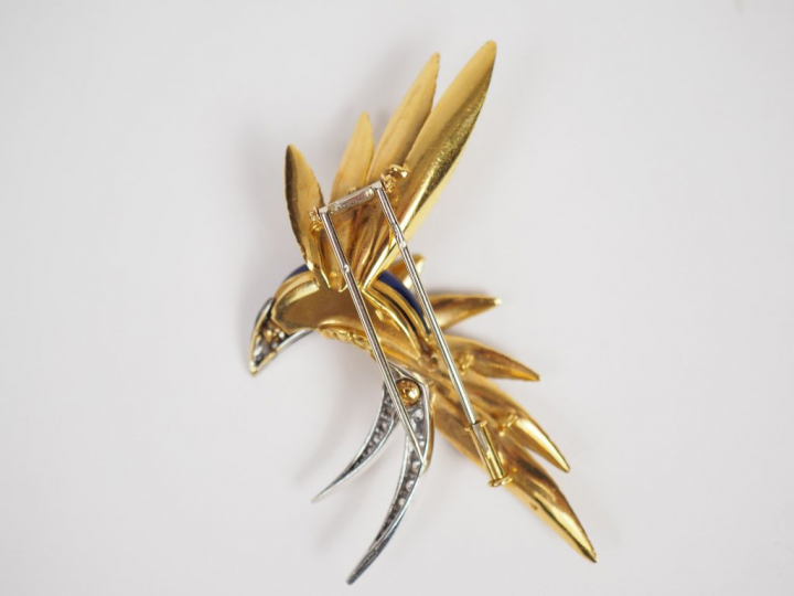 Pierre Sterlé (?) Broche "oiseau de paradis" en or jaune, diamants et 