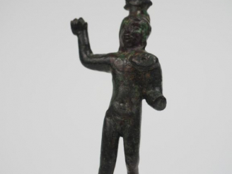 Vente aux enchères Statuette en bronze figurant un personnage nu coiffé d’une étoile. Pér