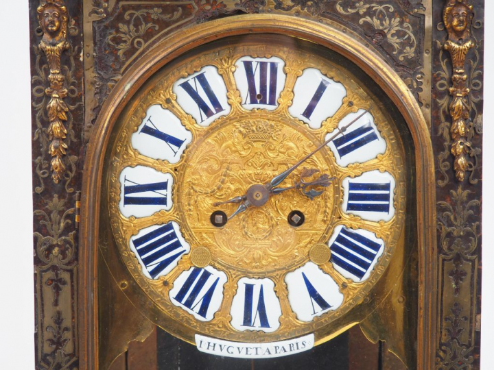 Cartel de style Louis XIV en marqueterie Boulle, à décor de guerrier. 