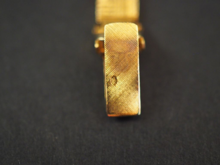 OMEGA. Montre bracelet de dame, boitier et bracelet en or jaune.  Poid