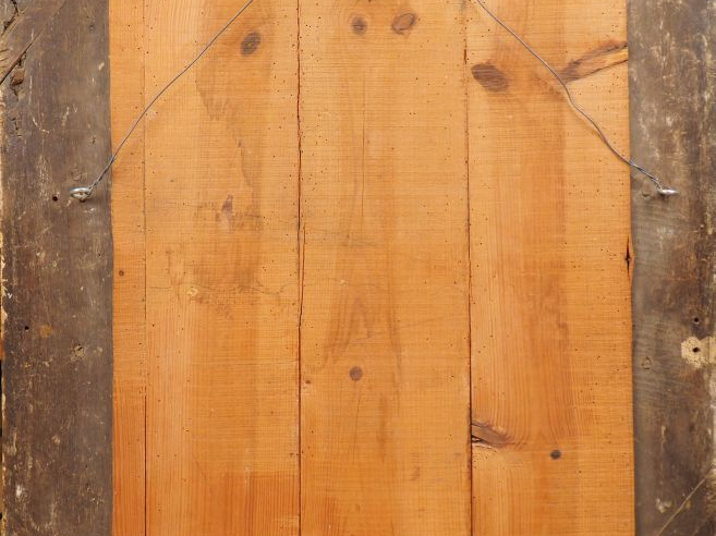 Miroir dans un cadre XVIIIème en bois et stuc doré à décor de fleurs e