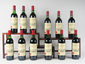 Vente aux enchères 12 BOUTEILLES CHÂTEAU GRAND CORBIN DESPAGNE GC ST EMILION - 1982 - CBO