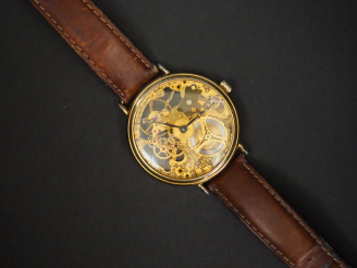 Vente aux enchères RICHELIEU. Montre squelette, bracelet cuir