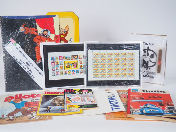 1 lot composé de 1 boite Delacre,3 cigares pharon, 9 calendriers TINTI