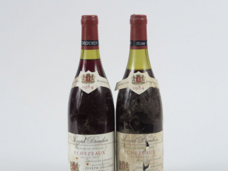 Vente aux enchères 2 BOUTEILLES ECHEZEAUX GC J. DROUHIN - 1984 - 1 à 1,5 CM/1 à 3,5 CM