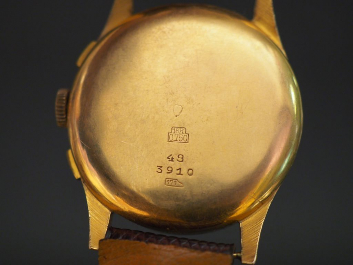 CAUNY. Montre d'homme, boitier or.