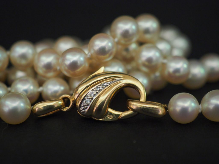 Collier de perles de culture fermoir or.