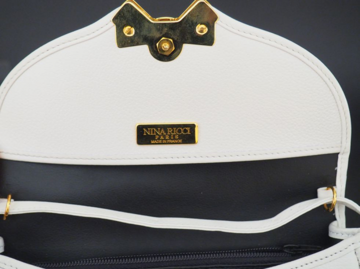NINA RICCI. Deux mini sacs blancs