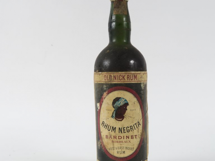 1 VIEILLE BOUTEILLE RHUM NEGRITA 'OLD NICK RUM'