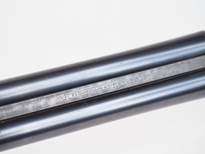 Joli fusil juxtaposé belge à contre platines et à éjecteurs par Dumoul