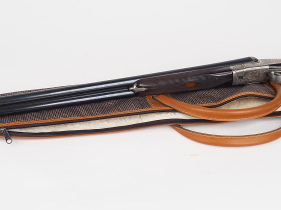 Joli fusil juxtaposé belge à contre platines et à éjecteurs par Dumoul