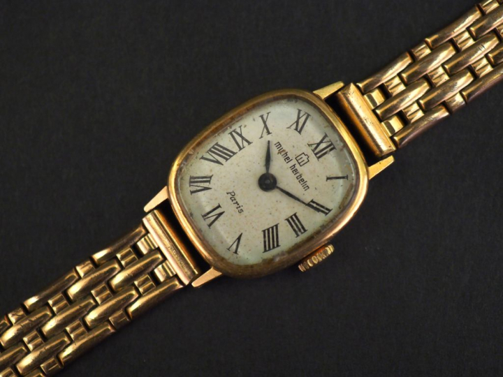 Michel HERBELIN Montre bracelet de dame, boitier en or jaune, bracelet