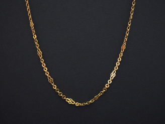 Vente aux enchères 	Sautoir en or jaune, maille forçat alterné de maillons quadrilobés. L