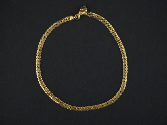 Vente aux enchères Bracelet articulé en or jaune, maille plate gourmette.  Long. 17 cm  P