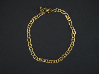 Vente aux enchères 	Bracelet souple en or jaune, maille marine. Long.17,5 cm  Poids. 5,45