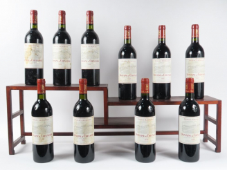 Vente aux enchères 10 BOUTEILLES DOMAINE DE CHEVALIER GCC GRAVES - 1986 - 5 BG/5 ELT