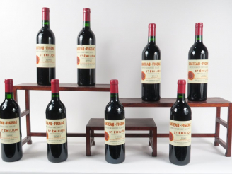 Vente aux enchères 8 BOUTEILLES CHÂTEAU FIGEAC 1er GCC ST EMILION - 1989