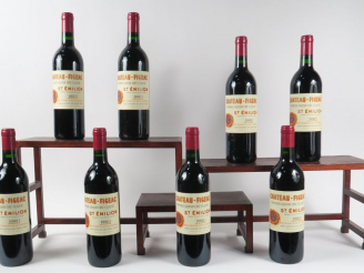 Vente aux enchères 8 BOUTEILLES CHÂTEAU FIGEAC 1er GCC ST EMILION - 1990 - 1 ETLD