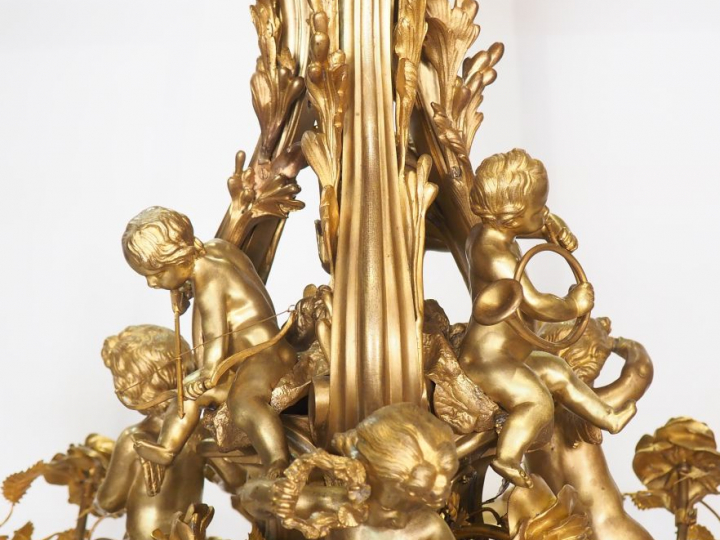 CAFFIERI (d'après). Exceptionnel lustre en bronze de style Louis XV d'