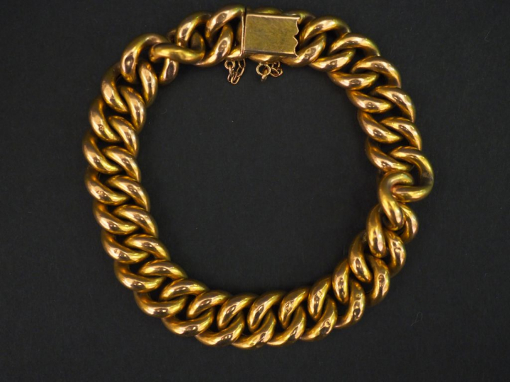 Bracelet articulé en or jaune, maille gourmette.  Poids. 21,06 g