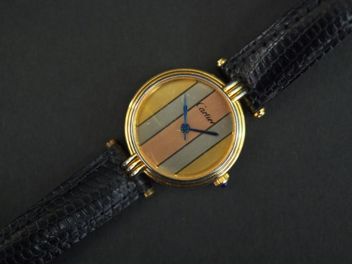CARTIER, Vendôme Trinity. Montre bracelet de dame, boitier en or et ac